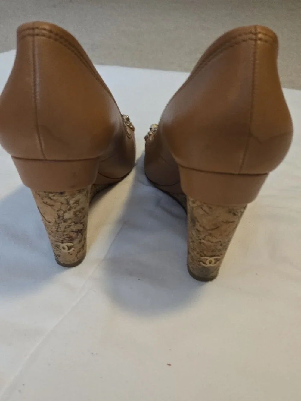 CHANEL Tan Leather Pumps with Gold Floral Accents
